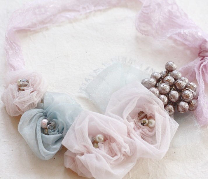 A Sample of Ruched Rosette Fabric Flower Bib Necklace